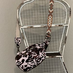 Cow print throw over bag